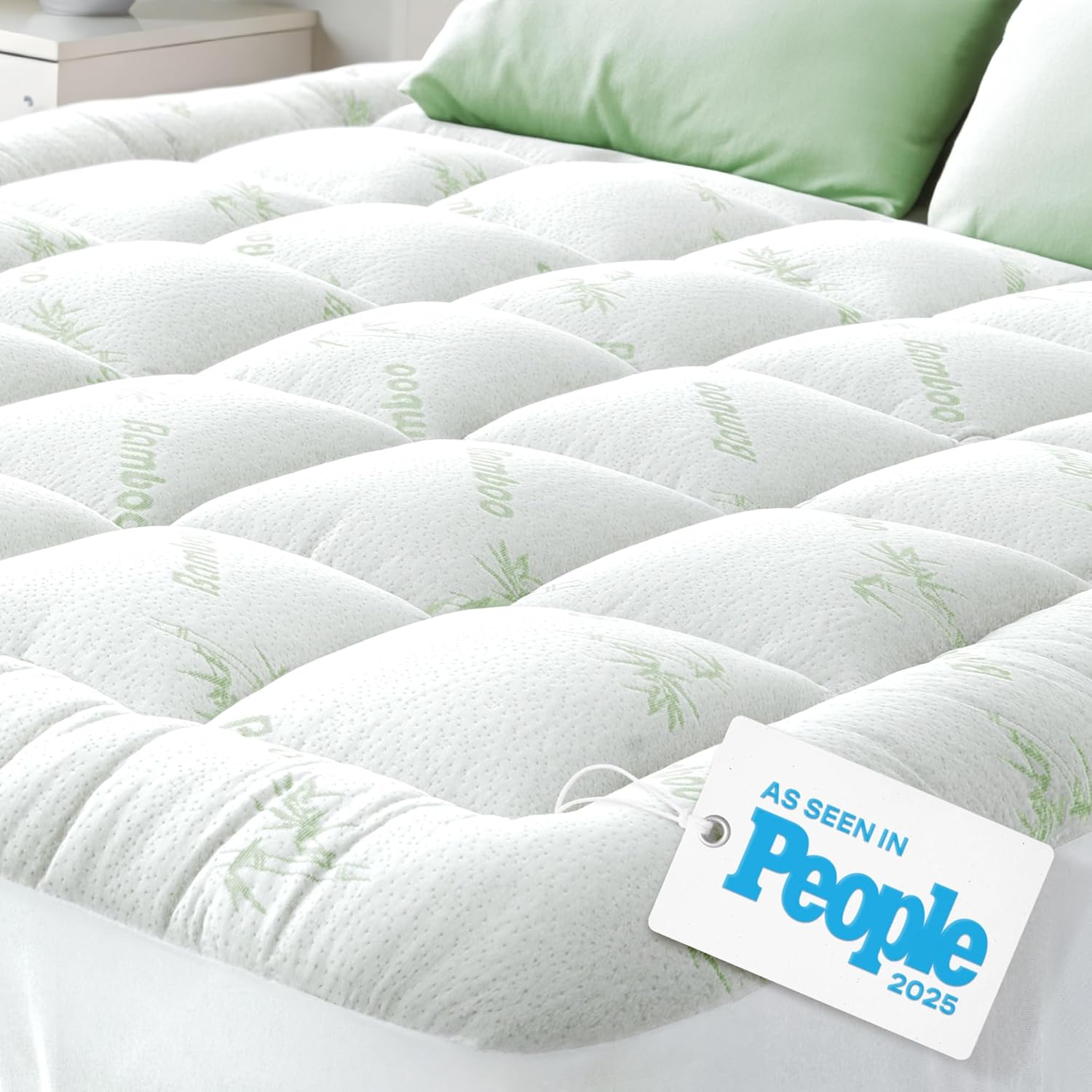 Ultra soft queen size bamboo viscose mattress topper with pillow top design for back pain relief and cooling comfort.